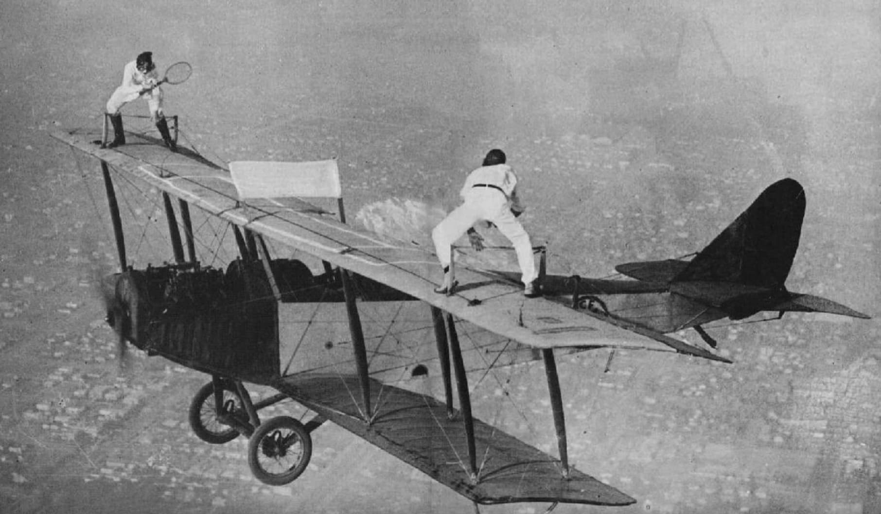 people playing tennis on plane